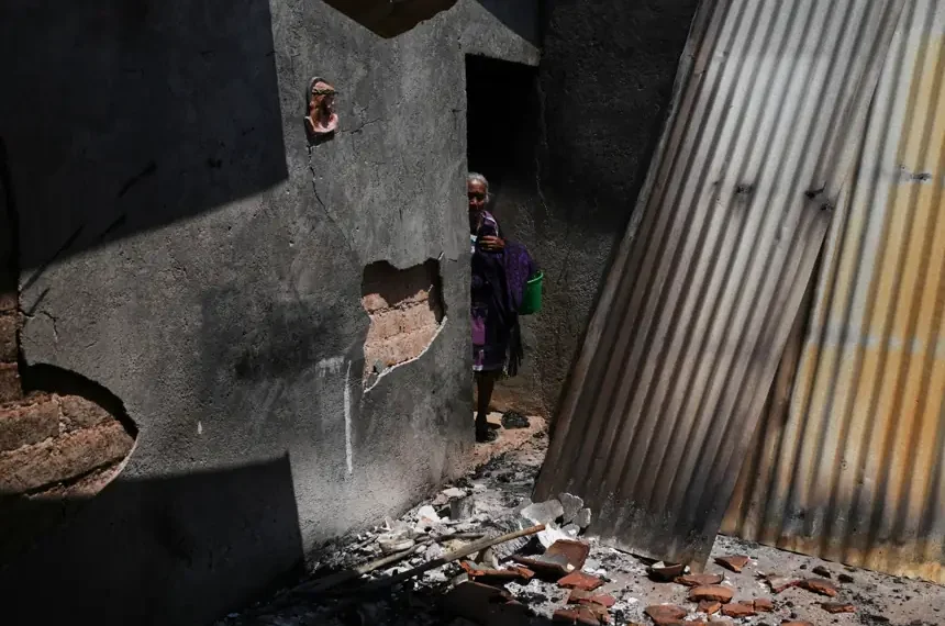 Displaced Indigenous families seek shelter after cartel violence in Guerrero - AP Photo/Marco Ugarte