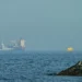 Naval vessels escort tankers through Strait of Hormuz amid tensions