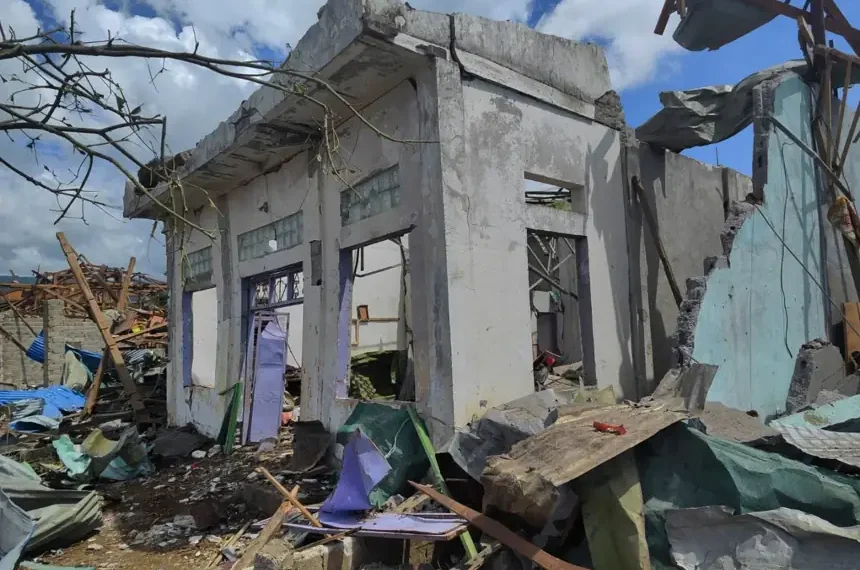 Damaged buildings after deadly explosives blast in northeastern Myanmar - Palaung Land via AP