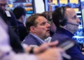 Traders monitor oil prices and global stock market movements amid Iran tensions - AP Photo/Richard Drew