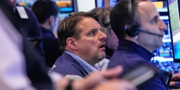 Traders monitor oil prices and global stock market movements amid Iran tensions - AP Photo/Richard Drew