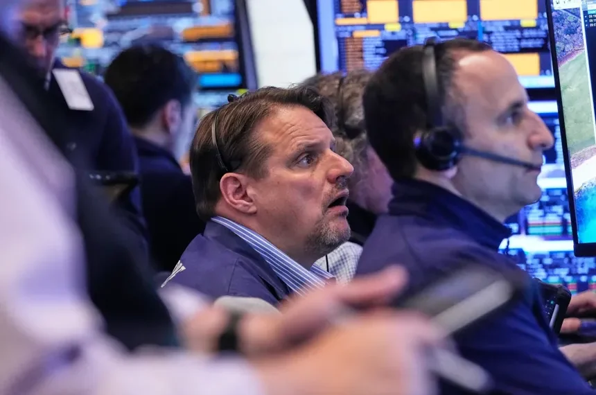 Traders monitor oil prices and global stock market movements amid Iran tensions - AP Photo/Richard Drew