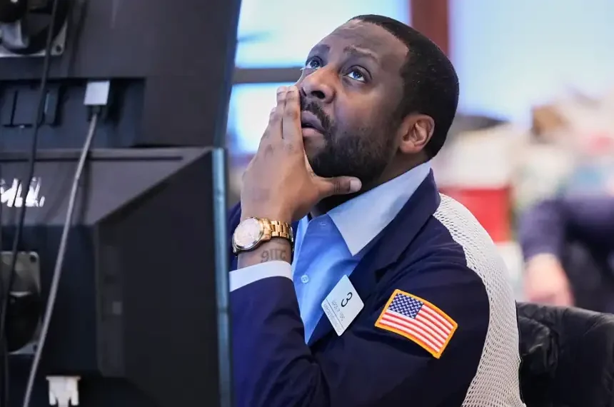 Traders monitor U.S. stock markets as oil prices fluctuate sharply - AP Photo/Richard Drew