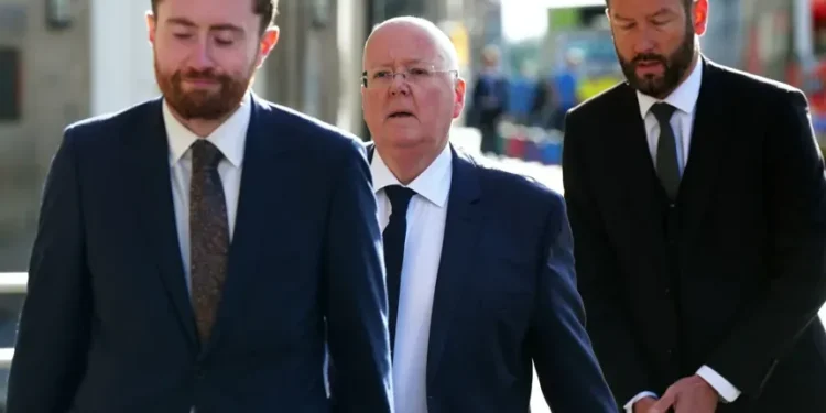 Peter Murrell arrives at court in Edinburgh during embezzlement proceedings - Jane Barlow/PA via AP
