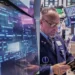 Rising U.S. mortgage rates amid strong Wall Street market performance - AP Photo/Richard Drew