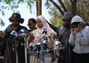 Police and emergency responders outside the Islamic Center of San Diego after the shooting - AP Photo/Jae C. Hong