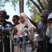 Police and emergency responders outside the Islamic Center of San Diego after the shooting - AP Photo/Jae C. Hong