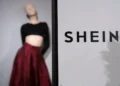 Shein and Everlane logos representing proposed fashion industry acquisition - AP Photo/Aurelien Morissard, File