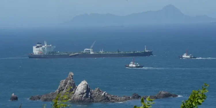 Oil tanker transits strategic Strait of Hormuz shipping corridor safely - AP Photo/Ahn Young-joon