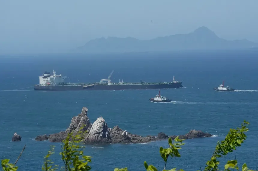 Oil tanker transits strategic Strait of Hormuz shipping corridor safely - AP Photo/Ahn Young-joon