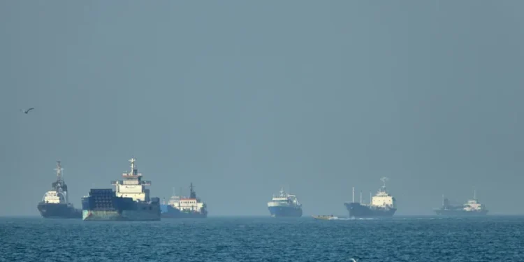 Cargo vessels anchored in Strait of Hormuz during US-Iran tensions - Amirhosein Khorgooi/ISNA via AP