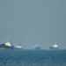 Cargo vessels anchored in Strait of Hormuz during US-Iran tensions - Amirhosein Khorgooi/ISNA via AP