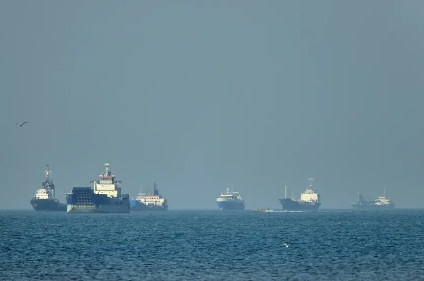 Cargo vessels anchored in Strait of Hormuz during US-Iran tensions - Amirhosein Khorgooi/ISNA via AP