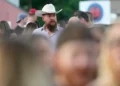Tall adults gathering together during a social meetup event - AP Photo/David J. Phillip