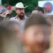 Tall adults gathering together during a social meetup event - AP Photo/David J. Phillip