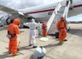 Passengers evacuated from MV Hondius during hantavirus containment operation - AP Photo