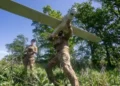 Ukrainian forces prepare air defense systems during escalating Russian missile attacks - AP Photo/Andrii Marienko