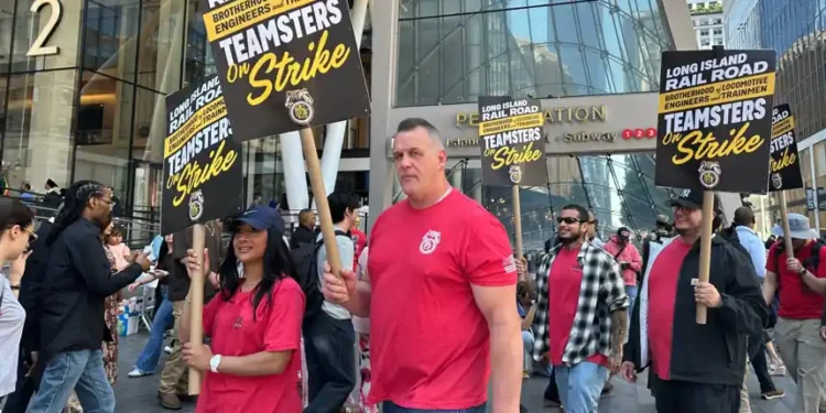 Long Island Rail Road workers picket outside New York Penn Station during strike - AP Photo/Michael R. Sisak