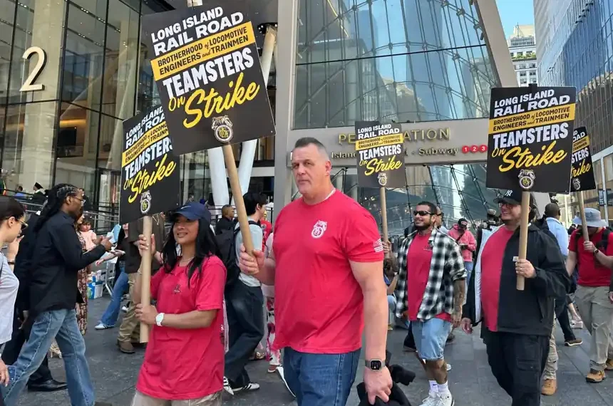 Long Island Rail Road workers picket outside New York Penn Station during strike - AP Photo/Michael R. Sisak