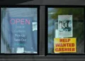 Hiring sign displayed outside US business amid labor market uncertainty - AP Photo/Nam Y. Huh