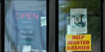 Hiring sign displayed outside US business amid labor market uncertainty - AP Photo/Nam Y. Huh