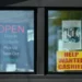 Hiring sign displayed outside US business amid labor market uncertainty - AP Photo/Nam Y. Huh