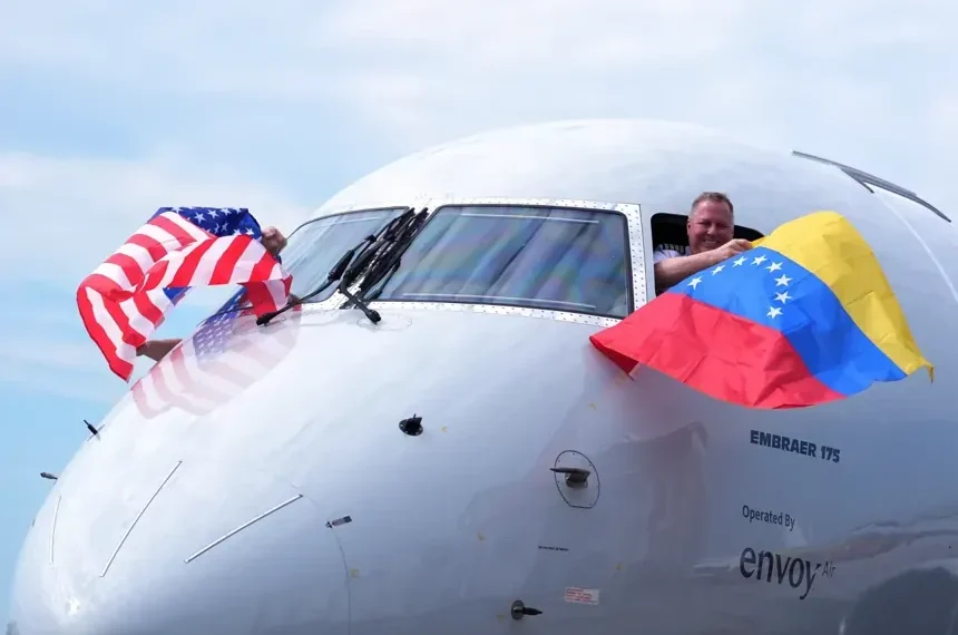 First US Venezuela direct flight arrives in Caracas airport - AP Photo/Rebecca Blackwell