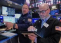 Traders on Wall Street amid rising inflation and consumer anxiety - AP Photo/Richard Drew