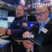 Traders on Wall Street amid rising inflation and consumer anxiety - AP Photo/Richard Drew