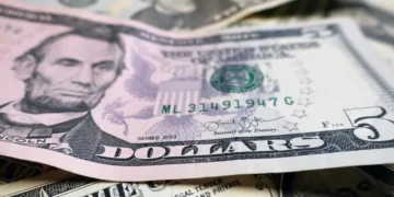 U.S. dollar currency decline affecting inflation and import prices - AP Photo/Ted Shaffrey, File