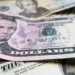 U.S. dollar currency decline affecting inflation and import prices - AP Photo/Ted Shaffrey, File