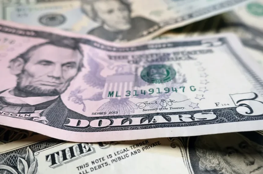U.S. dollar currency decline affecting inflation and import prices - AP Photo/Ted Shaffrey, File