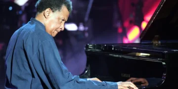 South African jazz pianist Abdullah Ibrahim performing on stage - AP Photo/Martin Meissner, File