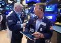 Traders react as AI stocks lift Wall Street records - AP Photo/Richard Drew