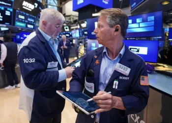 Traders react as AI stocks lift Wall Street records - AP Photo/Richard Drew