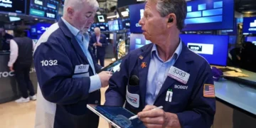 Traders react as AI stocks lift Wall Street records - AP Photo/Richard Drew
