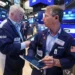 Traders react as AI stocks lift Wall Street records - AP Photo/Richard Drew