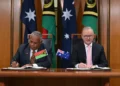 Australian and Vanuatu leaders sign bilateral security agreement in Canberra. - Lukas Coch/AAP Image via AP