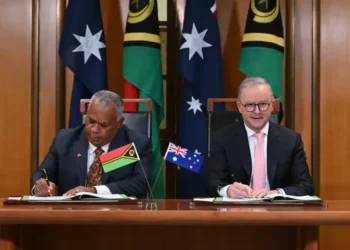 Australian and Vanuatu leaders sign bilateral security agreement in Canberra. - Lukas Coch/AAP Image via AP