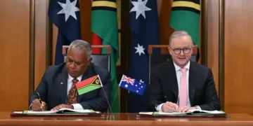 Australian and Vanuatu leaders sign bilateral security agreement in Canberra. - Lukas Coch/AAP Image via AP