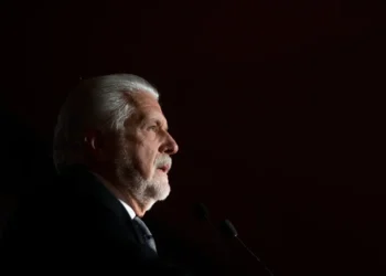 Brazilian federal police investigate senior senator linked to bank scandal - AP Photo/Felipe Dana, File