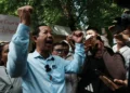 Rong Chhun greets supporters outside Cambodia Supreme Court - AP Photo/Heng Sinith