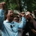 Rong Chhun greets supporters outside Cambodia Supreme Court - AP Photo/Heng Sinith