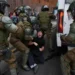 Protesters and police clash during education cuts rally in Santiago - AP Photo/Esteban Felix