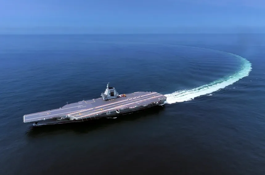 China's Fujian aircraft carrier transiting the Taiwan Strait - Ding Ziyu/Xinhua via AP