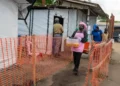 Volunteers prepare meals for Ebola patients in Bunia - AP Photo/Moses Sawasawa
