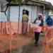 Volunteers prepare meals for Ebola patients in Bunia - AP Photo/Moses Sawasawa