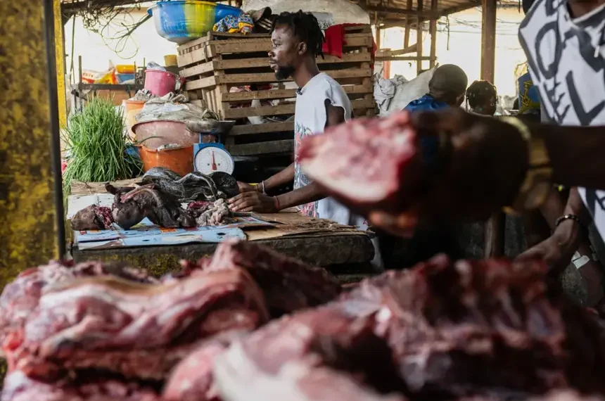 Bushmeat vendors operate at a market in Kinshasa, Congo - AP Photo/Samy Ntumba Shambuyi