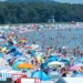 People seek shade during record-breaking heat across European cities - Stefan Sauer/dpa via AP