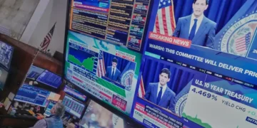 Traders monitor market movements after Federal Reserve projections release - AP Photo/Richard Drew